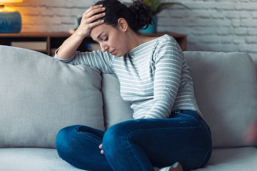 A lady is depressed and stressed