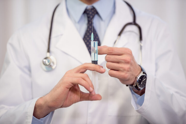 A doctor with injection.
